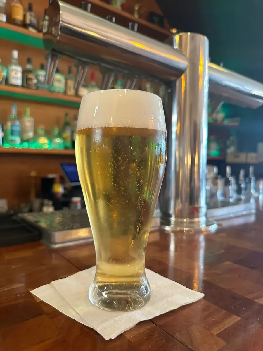 Happy Hour at Big Jones — Monday through Friday happy hour featuring $6 draft beers and wines, $12 Big Jones Handshake (bourbon shot with 10oz draft beer), $6 cornbread skillets, $12 fried chicken (light or dark meat; half chicken $24), and $12 pimiento cheeseburgers. Walk-ins welcome.
